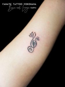 gclef line tattoo