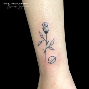 flower line tattoo