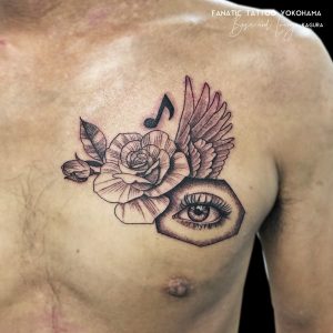 rose wing eye tattoo
